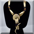 J105. Choker necklace with bone, metal and blue beads suede tie. - $38 